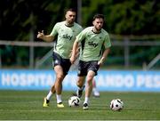 10 June 2024; Mikey Johnston and Shane Duffy, left, during a Republic of Ireland training session at Estádio de São Miguel in Gondomar, Portugal. Photo by Stephen McCarthy/Sportsfile