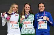 10 June 2024; Women's 1500m medallists, from left, Georgia Bell of Great Britain, silver, Ciara Mageean of Ireland, gold, and Agathe Guillemot of France, bronze, pose with their medals on the podium during day four of the 2024 European Athletics Championships at the Stadio Olimpico in Rome, Italy. Photo by Sam Barnes/Sportsfile