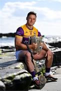 11 June 2024; Lee Chin of Wexford poses for a portrait with the Liam MacCarthy cup during the national launch of the GAA Hurling All-Ireland Senior Championship at Spanish Point in Clare. Photo by Brendan Moran/Sportsfile