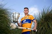 11 June 2024; Tony Kelly of Clare poses for a portrait with the Liam MacCarthy cup during the national launch of the GAA Hurling All-Ireland Senior Championship at Spanish Point in Clare. Photo by Brendan Moran/Sportsfile