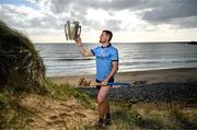 11 June 2024; Conor Donohoe of Dublin poses for a portrait with the Liam MacCarthy cup during the national launch of the GAA Hurling All-Ireland Senior Championship at Spanish Point in Clare. Photo by Brendan Moran/Sportsfile