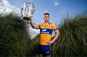 11 June 2024; Tony Kelly of Clare poses for a portrait with the Liam MacCarthy cup during the national launch of the GAA Hurling All-Ireland Senior Championship at Spanish Point in Clare. Photo by Brendan Moran/Sportsfile