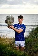 11 June 2024; David Dooley of Laois poses for a portrait with the Liam MacCarthy cup during the national launch of the GAA Hurling All-Ireland Senior Championship at Spanish Point in Clare. Photo by Brendan Moran/Sportsfile