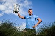 11 June 2024; Conor Donohoe of Dublin poses for a portrait with the Liam MacCarthy cup during the national launch of the GAA Hurling All-Ireland Senior Championship at Spanish Point in Clare. Photo by Brendan Moran/Sportsfile