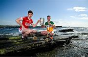 11 June 2024; Ethan Twomey of Cork, left, and Jason Sampson of Offaly pose for a portrait with the Liam MacCarthy cup during the national launch of the GAA Hurling All-Ireland Senior Championship at Spanish Point in Clare. Photo by Brendan Moran/Sportsfile