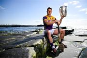 11 June 2024; Lee Chin of Wexford poses for a portrait with the Liam MacCarthy cup during the national launch of the GAA Hurling All-Ireland Senior Championship at Spanish Point in Clare. Photo by Brendan Moran/Sportsfile
