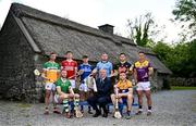 11 June 2024; Hurlers, from left, Jason Sampson of Offaly, Seamus Flanagan of Limerick, Ethan Twomey of Cork, David Dooley of Laois, Conor Donohoe of Dublin,   Tony Kelly of Clare, Paddy Deegan of Kilkenny and Lee Chin of Wexford with Uachtarán Chumann Lúthchleas Gael Jarlath Burns and the Liam MacCarthy cup during the national launch of the GAA Hurling All-Ireland Senior Championship at the Michael Cusack Centre in Carran, Clare. Photo by Brendan Moran/Sportsfile