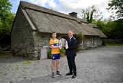 11 June 2024; Tony Kelly of Clare with Uachtarán Chumann Lúthchleas Gael Jarlath Burns and the Liam MacCarthy cup during the national launch of the GAA Hurling All-Ireland Senior Championship at the Michael Cusack Centre in Carran, Clare. Photo by Brendan Moran/Sportsfile