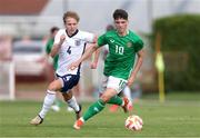 11 June 2024; Andy Moran of Republic of Ireland in action against Sammy Braybrooke of England during the international friendly match between England U20's and Republic of Ireland U21's at Gradski Stadion in Zagreb, Croatia. Photo by Vid Ponikvar/Sportsfile