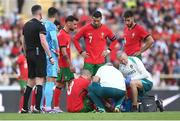 11 June 2024; Pepe of Portugal is attended to by medical personnel as Portugal players, from left, Portugal goalkeeper Diogo Costa, Bruno Fernandes, Cristiano Ronaldo and António Silva look on during the international friendly match between Portugal and Republic of Ireland at Estádio Municipal de Aveiro in Aveiro, Portugal. Photo by Stephen McCarthy/Sportsfile