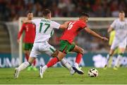 11 June 2024; Matheus Nunes of Portugal is tackled by Jason Knight of Republic of Ireland during the international friendly match between Portugal and Republic of Ireland at Estádio Municipal de Aveiro in Aveiro, Portugal. Photo by Stephen McCarthy/Sportsfile