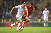 11 June 2024; Mark Sykes of Republic of Ireland in action against Goncalo Inácio of Portugal during the international friendly match between Portugal and Republic of Ireland at Estádio Municipal de Aveiro in Aveiro, Portugal. Photo by Stephen McCarthy/Sportsfile