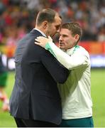 11 June 2024; Republic of Ireland interim head coach John O'Shea with Portugal assistant coach Anthony Barry after the international friendly match between Portugal and Republic of Ireland at Estádio Municipal de Aveiro in Aveiro, Portugal. Photo by Stephen McCarthy/Sportsfile