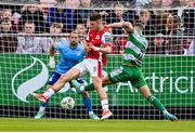 13 June 2024; Mason Melia of St Patrick's Athletic in action against Lee Grace of Shamrock Rovers during the SSE Airtricity Men's Premier Division match between St Patrick's Athletic and Shamrock Rovers at Richmond Park in Dublin. Photo by Seb Daly/Sportsfile