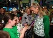13 June 2024; Alannah Kirk, left, and Olivia Leonard, both age 10, from Dublin with Sharlene Mawdsley and her gold and silver medals at Dublin Airport on her return home from the European Athletics Championships in Rome, Italy. Photo by David Fitzgerald/Sportsfile