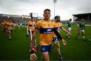 9 June 2024; John Conlon of Clare walks in the pre-match parade before the Munster GAA Hurling Senior Championship final match between Clare and Limerick at FBD Semple Stadium in Thurles, Tipperary. Photo by Brendan Moran/Sportsfile