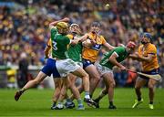 9 June 2024; Limerick players, from left, Dan Morrissey, 3, Kyle Hayes and Barry Nash contest a dropping ball with Clare players, from centre, David Fitzgerald and Shane O'Donnell during the Munster GAA Hurling Senior Championship final match between Clare and Limerick at FBD Semple Stadium in Thurles, Tipperary. Photo by Brendan Moran/Sportsfile