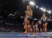 12 June 2024; Sharlene Mawdsley of Ireland after taking the baton from team-mate Phil Healy in the women's 4x400m relay final during day six of the 2024 European Athletics Championships at the Stadio Olimpico in Rome, Italy. Photo by Sam Barnes/Sportsfile