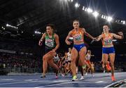 12 June 2024; Phil Healy of Ireland, left, and Lisanne De Witte of Netherlands compete in the women's 4x400m relay final during day six of the 2024 European Athletics Championships at the Stadio Olimpico in Rome, Italy. Photo by Sam Barnes/Sportsfile