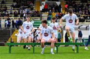 15 June 2024; The Kildare panel make their way onto the pitch for a team photograph before the Electric Ireland GAA Football All-Ireland Minor Championship Tier 2 final match between Cavan and Kildare at Páirc Tailteann in Navan, Meath. Photo by Tyler Miller/Sportsfile