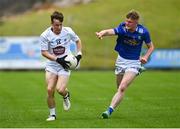15 June 2024; Austin Donegan of Kildare in action against Andrew Hill of Cavan during the Electric Ireland GAA Football All-Ireland Minor Championship Tier 2 final match between Cavan and Kildare at Páirc Tailteann in Navan, Meath. Photo by Tyler Miller/Sportsfile