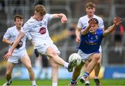 15 June 2024; Ronan Kelly of Kildare has an attempt on goal blocked by Fiachra Brady of Cavan during the Electric Ireland GAA Football All-Ireland Minor Championship Tier 2 final match between Cavan and Kildare at Páirc Tailteann in Navan, Meath. Photo by Tyler Miller/Sportsfile