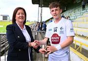 15 June 2024; Electric Ireland portfolio sales manager in business markets Sarah Robinson presents the player of the match award to Austin Donegan of Kildare who was awarded Player of the Match in today’s Electric Ireland GAA Football All-Ireland Minor Championship Tier 2 Final versus Cavan at Páirc Tailteann. #ThisIsMajor Photo by Tyler Miller/Sportsfile