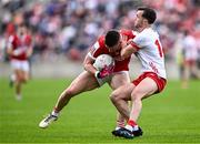 15 June 2024; Kevin Flahive of Cork in action against Darragh Canavan of Tyrone during the GAA Football All-Ireland Senior Championship Round 3 match between Cork and Tyrone at Glenisk O'Connor Park in Tullamore, Offaly. Photo by Piaras Ó Mídheach/Sportsfile