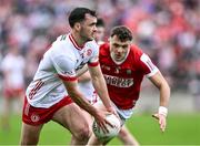 15 June 2024; Darragh Canavan of Tyrone in action against Daniel O' Mahony of Cork during the GAA Football All-Ireland Senior Championship Round 3 match between Cork and Tyrone at Glenisk O'Connor Park in Tullamore, Offaly. Photo by Piaras Ó Mídheach/Sportsfile