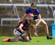 15 June 2024; Harry Holmes of Galway in action against Patrick Ryan of Tipperary during the Electric Ireland GAA Hurling All-Ireland Minor Hurling Championship semi-final match between Tipperary and Galway at TUS Gaelic Grounds in Limerick. Photo by Tom Beary/Sportsfile
