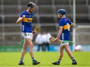 15 June 2024; Owen O'Dwyer, left, celebrates at the final whistle with his Tipperary teammate Shane Ryan after the Electric Ireland GAA Hurling All-Ireland Minor Hurling Championship semi-final match between Tipperary and Galway at TUS Gaelic Grounds in Limerick. Photo by Tom Beary/Sportsfile
