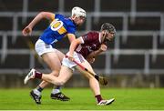 15 June 2024; Rhys O'Connor of Galway is tackled by Adam Ryan of Tipperary during the Electric Ireland GAA Hurling All-Ireland Minor Hurling Championship semi-final match between Tipperary and Galway at TUS Gaelic Grounds in Limerick. Photo by Tom Beary/Sportsfile