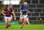 15 June 2024; Euan Murray of Tipperary in action against Cathal Maloney of Galway during the Electric Ireland GAA Hurling All-Ireland Minor Hurling Championship semi-final match between Tipperary and Galway at TUS Gaelic Grounds in Limerick. Photo by Tom Beary/Sportsfile