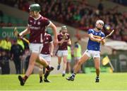 15 June 2024; Euan Murray of Tipperary scores a point during the Electric Ireland GAA Hurling All-Ireland Minor Hurling Championship semi-final match between Tipperary and Galway at TUS Gaelic Grounds in Limerick. Photo by Tom Beary/Sportsfile