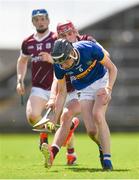 15 June 2024; Owen O'Dwyer of Tipperary is tackled by Harry Holmes of Galway during the Electric Ireland GAA Hurling All-Ireland Minor Hurling Championship semi-final match between Tipperary and Galway at TUS Gaelic Grounds in Limerick. Photo by Tom Beary/Sportsfile