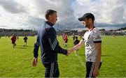 15 June 2024; Down manager Conor Laverty, right, and Wicklow manager Oisín McConville shake hands after the Tailteann Cup quarter-final match between Down and Wicklow at Páirc Esler in Newry, Down. Photo by Sam Barnes/Sportsfile