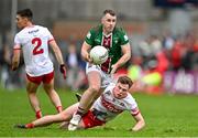 15 June 2024; Jamie Gonoud of Westmeath in action against Conor McCluskey, left, and Eoin McEvoy of Derry during the GAA Football All-Ireland Senior Championship Round 3 match between Derry and Westmeath at Páirc Esler in Newry, Down. Photo by Sam Barnes/Sportsfile