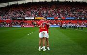 15 June 2024; Simon Zebo of Munster, left, with teammate Alex Nankivell, as he leaves the pitch for the last time before retirement after the United Rugby Championship semi-final match between Munster and Glasgow Warriors at Thomond Park in Limerick. Photo by Brendan Moran/Sportsfile