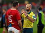 15 June 2024; Munster captain Tadhg Beirne speaks to referee Andrea Piardi after the United Rugby Championship semi-final match between Munster and Glasgow Warriors at Thomond Park in Limerick. Photo by Brendan Moran/Sportsfile