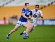 16 June 2024; James Kelly of Laois in action against Shea Ryan of Kildare during the Tailteann Cup quarter-final match between Kildare at Laois at Glenisk O'Connor Park in Tullamore, Offaly. Photo by Stephen Marken/Sportsfile