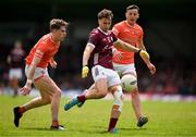 16 June 2024; Robert Finnerty of Galway in action against Andrew Murnin and Aaron McKay of Armagh during the GAA Football All-Ireland Senior Championship Round 3 match between Armagh and Galway at Markievicz Park in Sligo. Photo by Brendan Moran/Sportsfile