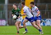 16 June 2024; Cathal Hickey of Meath in action against Ryan McAnespie, centre, and Micheál Bannigan  of Monaghan during the GAA Football All-Ireland Senior Championship Round 3 match between Monaghan and Meath at Kingspan Breffni in Cavan. Photo by Ben McShane/Sportsfile