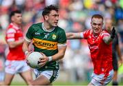 16 June 2024; Paudie Clifford of Kerry in action against Donal McKenny of Louth during the GAA Football All-Ireland Senior Championship Round 3 match between Kerry and Louth at MW Hire O'Moore Park in Portlaoise, Laois. Photo by Tyler Miller/Sportsfile