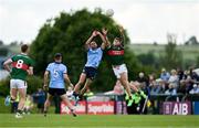16 June 2024; Jordan Flynn of Mayo in action against Niall Scully of Dublin during the GAA Football All-Ireland Senior Championship Round 3 match between Dublin and Mayo at Dr Hyde Park in Roscommon. Photo by Daire Brennan/Sportsfile