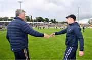 16 June 2024; Meath manager Colm O'Rourke and Monaghan manager Vinny Corey shake hands after the GAA Football All-Ireland Senior Championship Round 3 match between Monaghan and Meath at Kingspan Breffni in Cavan. Photo by Ben McShane/Sportsfile