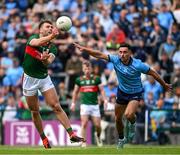 16 June 2024; Aidan O'Shea of Mayo in action against Niall Scully of Dublin during the GAA Football All-Ireland Senior Championship Round 3 match between Dublin and Mayo at Dr Hyde Park in Roscommon. Photo by Daire Brennan/Sportsfile
