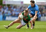 16 June 2024; Ryan O'Donoghue of Mayo in action against Michael Fitzsimons of Dublin during the GAA Football All-Ireland Senior Championship Round 3 match between Dublin and Mayo at Dr Hyde Park in Roscommon. Photo by Daire Brennan/Sportsfile