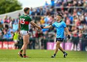 16 June 2024; Eoin Murchan of Dublin shakes hands with Aidan O'Shea of Mayo after the GAA Football All-Ireland Senior Championship Round 3 match between Dublin and Mayo at Dr Hyde Park in Roscommon. Photo by Daire Brennan/Sportsfile
