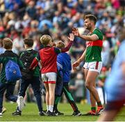 16 June 2024; Aidan O'Shea of Mayo with supporters after the GAA Football All-Ireland Senior Championship Round 3 match between Dublin and Mayo at Dr Hyde Park in Roscommon. Photo by Daire Brennan/Sportsfile