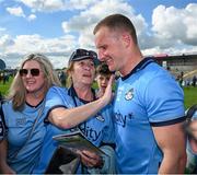16 June 2024; Ciaran Kilkenny of Dublin is congratulated by supporters after the GAA Football All-Ireland Senior Championship Round 3 match between Dublin and Mayo at Dr Hyde Park in Roscommon. Photo by Ray McManus/Sportsfile